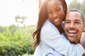 Portrait Of Loving African American Couple In Countryside